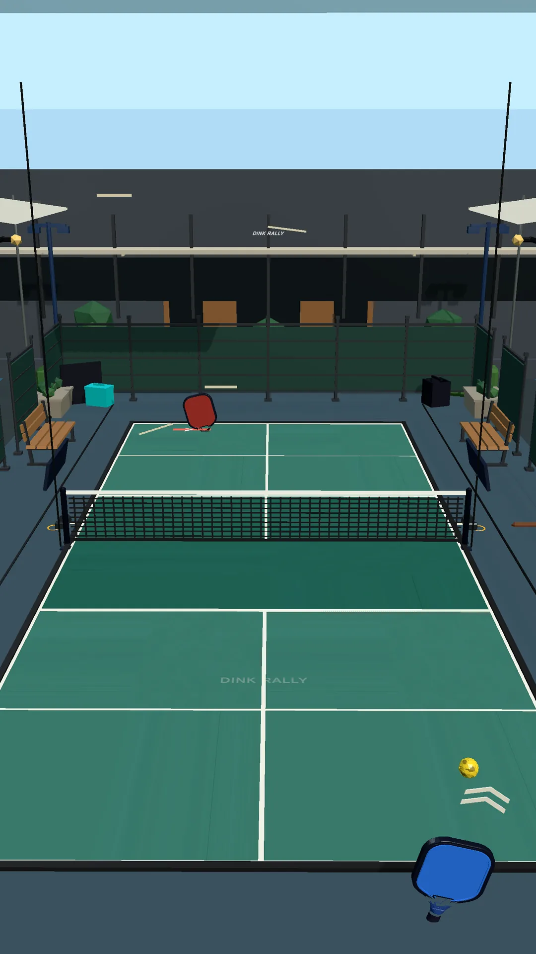 Dink Rally classic court in green with the net, the opponent's paddle across the court, and the venue around it.